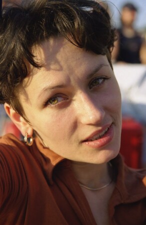 Только она..