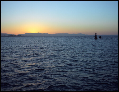 Закат на UMM Gamar