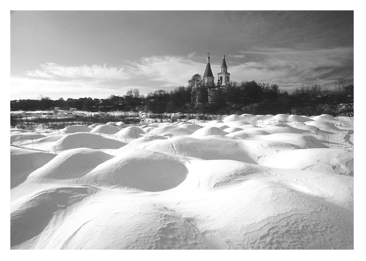 В снегах.