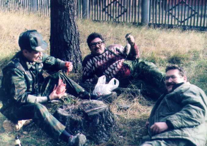 трое охотников на привале