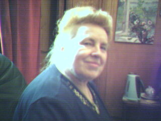 Улыбается бабушка