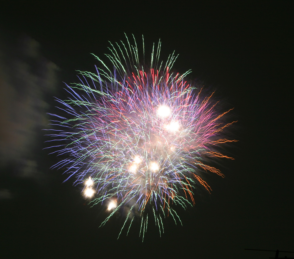 Rockets bursting in air