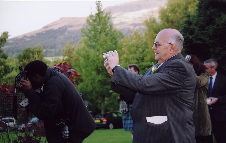 the Godfather taking pictures