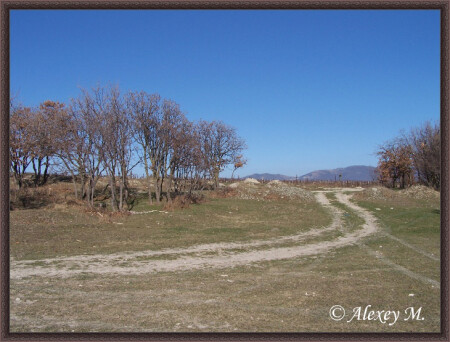 По проселочной