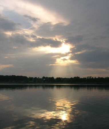 С парома.