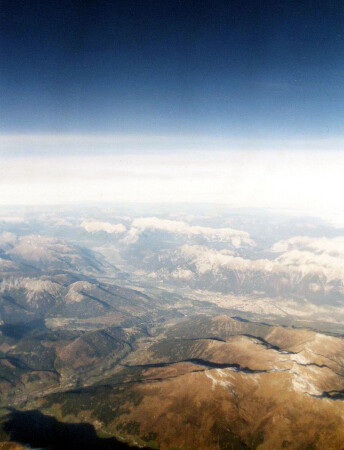 За облаками