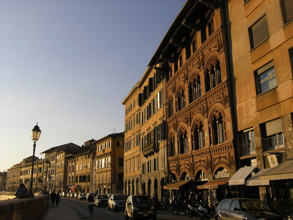 Sunset fading facedes of Pisa