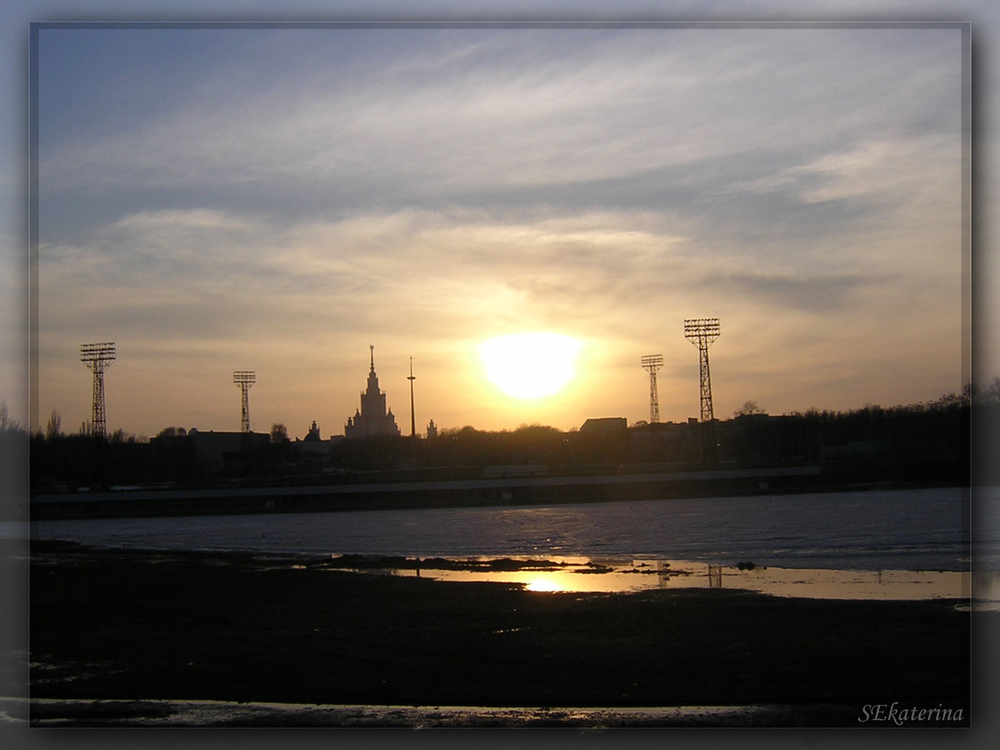 город