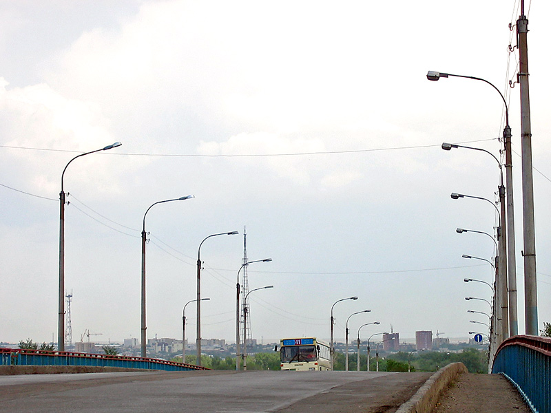 В город...
