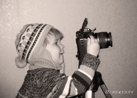 ... Маленький фотограф....