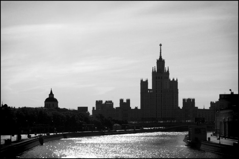 город