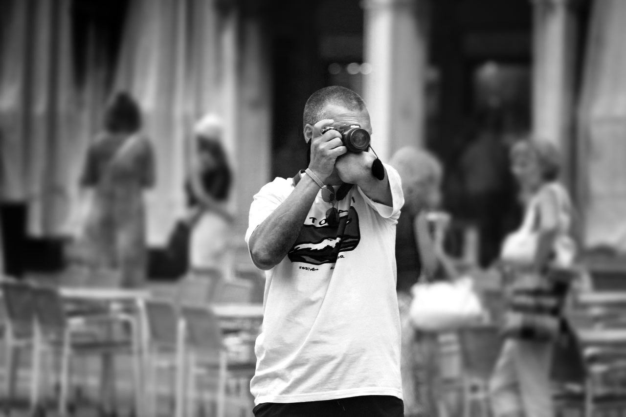 Однорукий фотограф