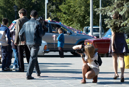 подглядеть за девушкой фотографом :)