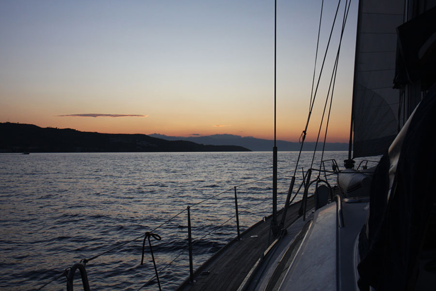 Sunset on board of the yacht 