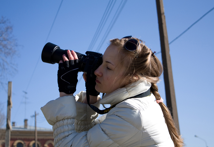 A girl with photo camera