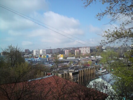 город