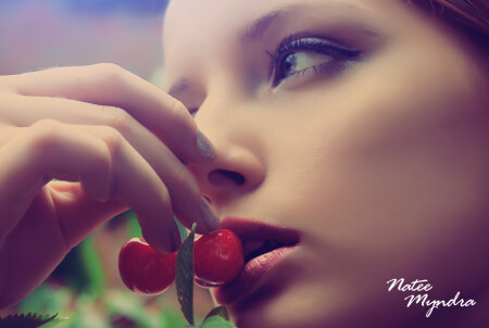 by Natee