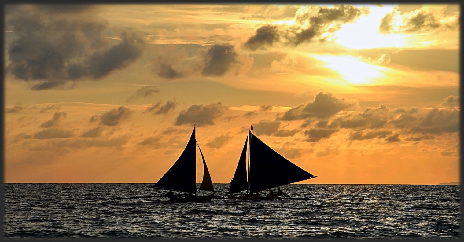 sailingboats on sunset