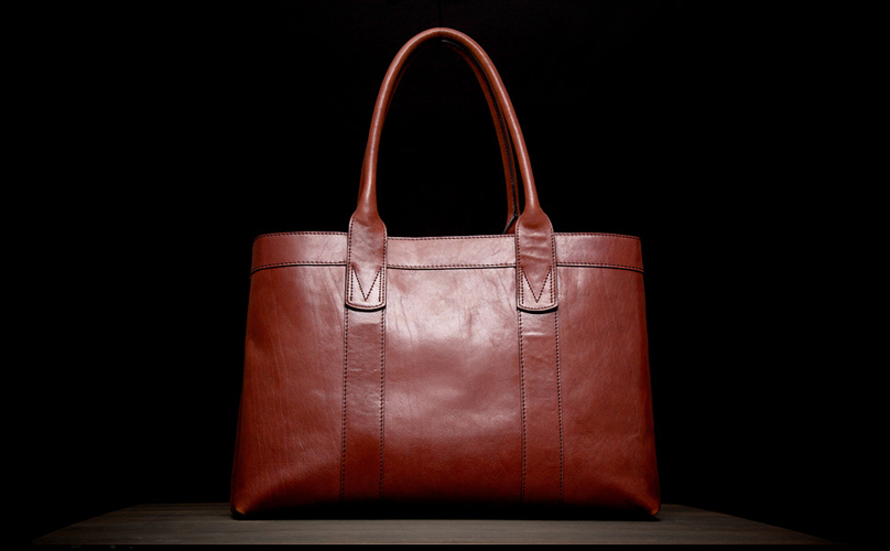 COGNAC FLY BAG