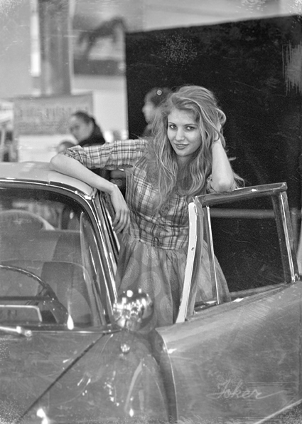 Old car and young girl