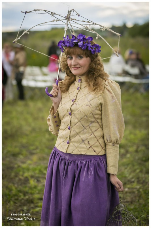 The lady with the umbrella.